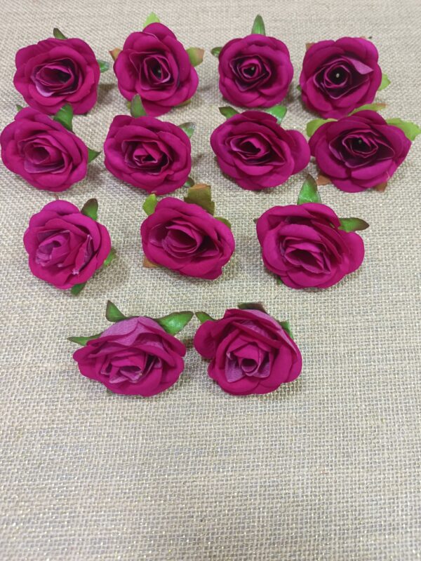 Artificial Velvet Rose Flowers 

size. 4cm
pack of. 50pc